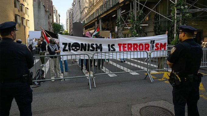 zionism-is-terrorism-protest-sign.jpg