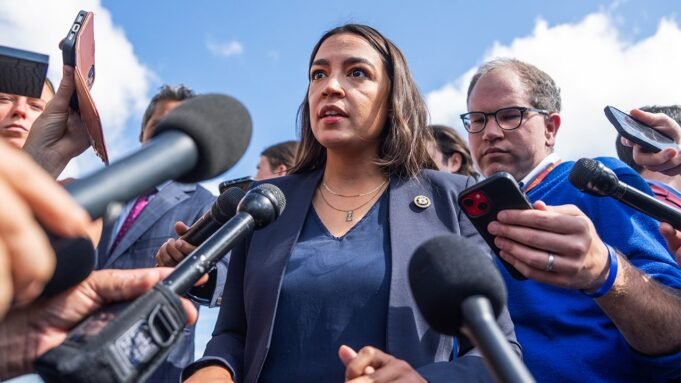 aoc-with-reporters.jpg