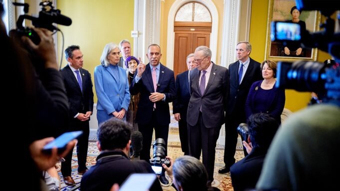 house-and-senate-democrats-stand-in-hallway.jpg