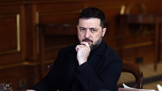 volodymyr-zelenskyy-sitting-desk.jpg