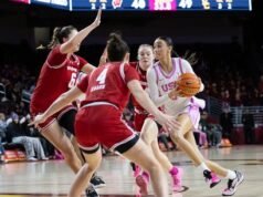 Obrazy TST: Trojany USC pokonują Wisconsin Badgers 66-59 w Galen Center